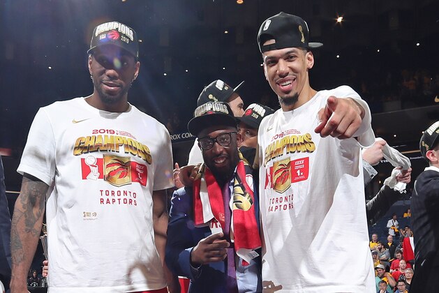 OAKLAND, CA - JUNE 13: Kawhi Leonard #2 and Danny Green #14 of the Toronto Raptors react onstage after defeating the Golden State Warriors in Game Six of the 2019 NBA Finals on June 13, 2019 at ORACLE Arena in Oakland, California. NOTE TO USER: User expressly acknowledges and agrees that, by downloading and/or using this photograph, user is consenting to the terms and conditions of Getty Images License Agreement. Mandatory Copyright Notice: Copyright 2019 NBAE (Photo by Nathaniel S. Butler/NBAE via Getty Images)