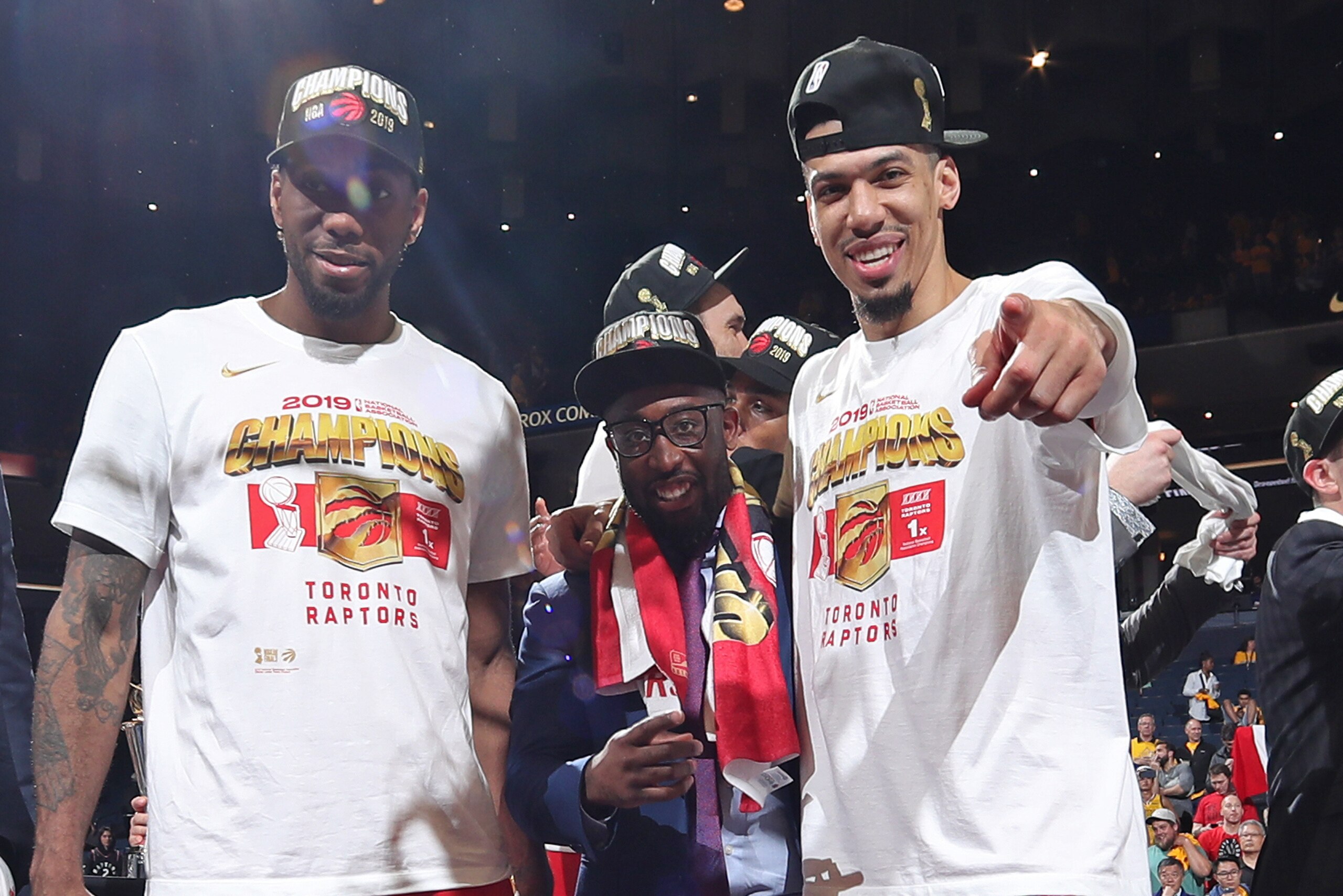 OAKLAND, CA - JUNE 13: Kawhi Leonard #2 and Danny Green #14 of the Toronto Raptors react onstage after defeating the Golden State Warriors in Game Six of the 2019 NBA Finals on June 13, 2019 at ORACLE Arena in Oakland, California. NOTE TO USER: User expressly acknowledges and agrees that, by downloading and/or using this photograph, user is consenting to the terms and conditions of Getty Images License Agreement. Mandatory Copyright Notice: Copyright 2019 NBAE (Photo by Nathaniel S. Butler/NBAE via Getty Images)
