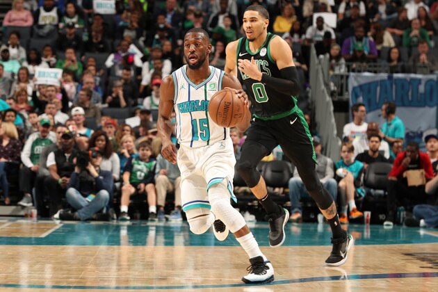CHARLOTTE, NC - MARCH 23: Kemba Walker #15 of the Charlotte Hornets handles the ball against the Boston Celtics on March 23, 2019 at Spectrum Center in Charlotte, North Carolina. NOTE TO USER: User expressly acknowledges and agrees that, by downloading and or using this photograph, User is consenting to the terms and conditions of the Getty Images License Agreement.  Mandatory Copyright Notice: Copyright 2019 NBAE (Photo by Kent Smith/NBAE via Getty Images)