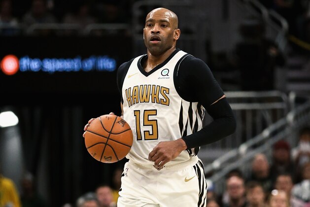 MILWAUKEE, WISCONSIN - APRIL 07:  Vince Carter #15 of the Atlanta Hawks dribbles the ball in the fourth quarter against the Milwaukee Bucks at the Fiserv Forum on April 07, 2019 in Milwaukee, Wisconsin. NOTE TO USER: User expressly acknowledges and agrees that, by downloading and or using this photograph, User is consenting to the terms and conditions of the Getty Images License Agreement. (Photo by Dylan Buell/Getty Images)