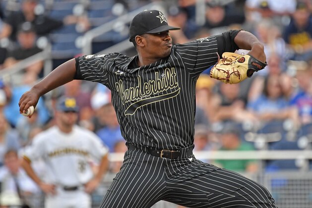 OMAHA, NE - JUNE 25:  Pitcher Kumar Rocker #80 of the Vanderbilt Commodores delivers a pitch in the first inning against the Michigan Wolverines during game two of the College World Series Championship Series on June 25, 2019 at TD Ameritrade Park Omaha in Omaha, Nebraska.  (Photo by Peter Aiken/Getty Images)