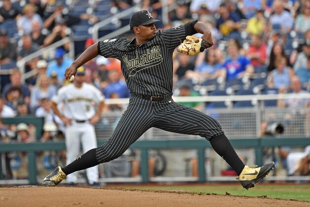 OMAHA, NE - JUNE 25:  Pitcher Kumar Rocker #80 of the Vanderbilt Commodores delivers a pitch in the first inning against the Michigan Wolverines during game two of the College World Series Championship Series on June 25, 2019 at TD Ameritrade Park Omaha in Omaha, Nebraska.  (Photo by Peter Aiken/Getty Images)
