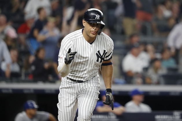 NEW YORK, NEW YORK - JUNE 24: Giancarlo Stanton #27 of the New York Yankees reacts to the dugout after hitting a three run home run against the Toronto Blue Jays in the sixth inning at Yankee Stadium on June 24, 2019 in New York City. (Photo by Michael Owens/Getty Images)