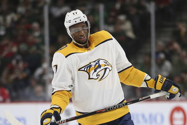 Nashville Predators' Wayne Simmonds rects during the second period of an NHL hockey game against the Minnesota Wild, Sunday, March 3, 2019, in St. Paul, Minn. (AP Photo/Stacy Bengs)