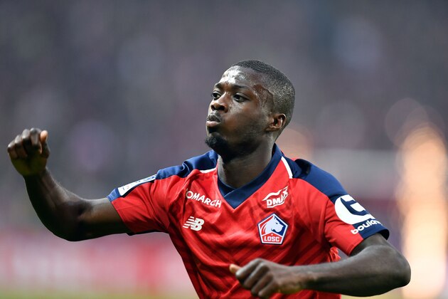 Lille's Ivorian forward Nicolas Pepe celebrates  after scoring a goal during the French L1 football match between Lille (LOSC) and Angers (SCO) at the Pierre-Mauroy Stadium in Villeneuve d'Ascq, near Lille, northern France, on May 18 2019. (Photo by DENIS CHARLET / AFP)        (Photo credit should read DENIS CHARLET/AFP/Getty Images)
