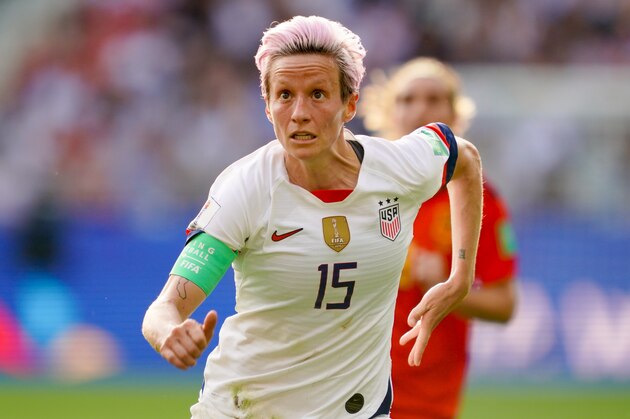 REIMS, FRANCE - JUNE 24: Megan Rapinoe #15 of the United States looks on during a 2019 FIFA Women's World Cup France Round of 16 match between Spain and the United States at Stade Auguste-Delaune on June 24, 2019 in Reims, France.  (Photo by John Todd/isiphotos.com/Getty Images).