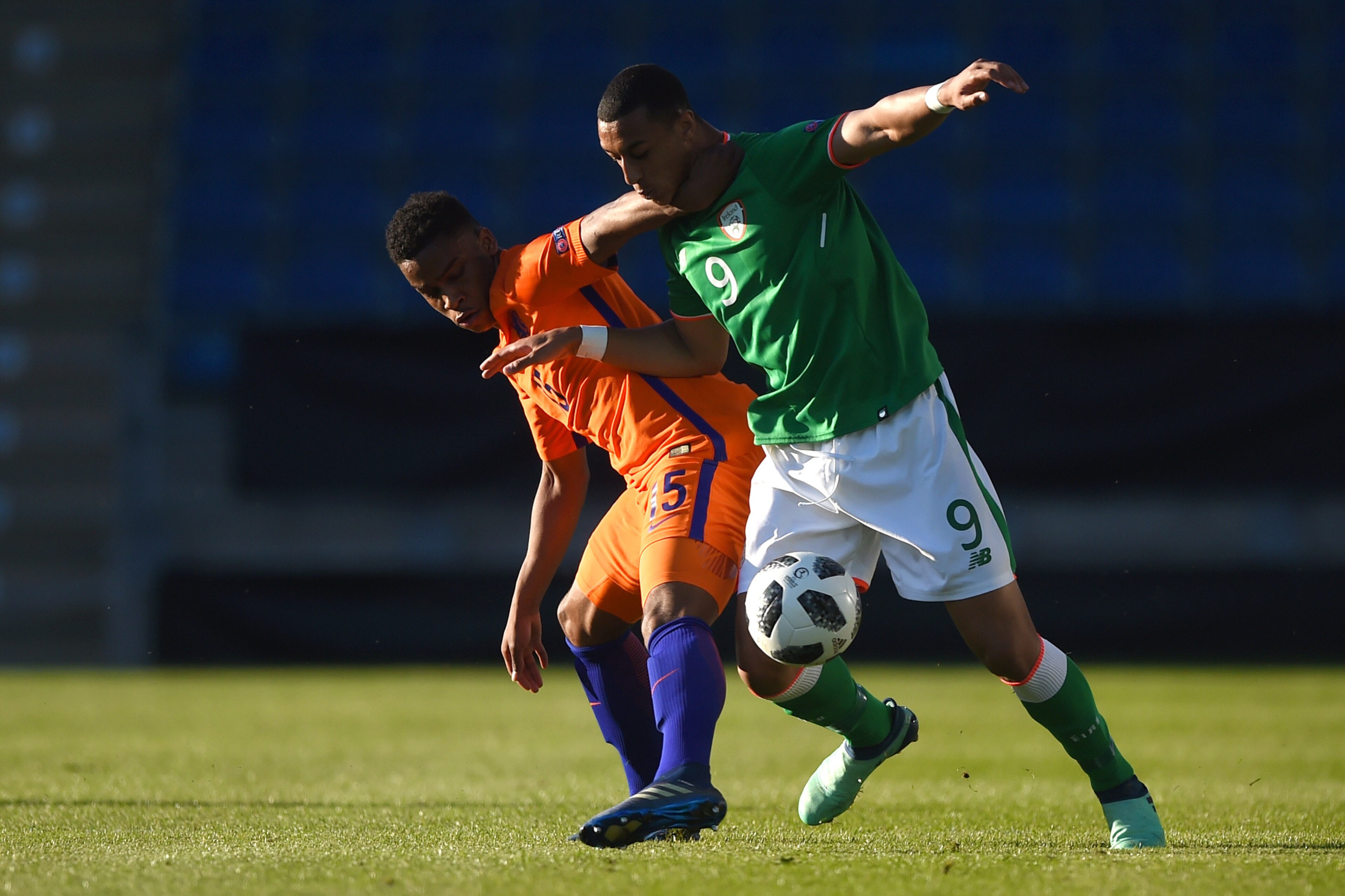 CHESTERFIELD, ENGLAND - MAY 14: Jurrien Maduro of Netherlands and Adam Idah of Ireland in action during the UEFA European Under-17 Championship match between Netherlands and Ireland at Proact Stadium on May 14, 2018 in Chesterfield, England. (Photo by Nathan Stirk/Getty Images)