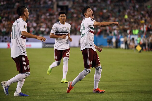 CHARLOTTE, NC - JUNE 23: Uriel Antuna of Mexico celebrates after scoring a goal to make it 0-1 during the Group A 2019 CONCACAF Gold Cup match between Martinique v Mexico at Bank of America Stadium on June 23, 2019 in Charlotte, North Carolina. (Photo by Matthew Ashton - AMA/Getty Images)