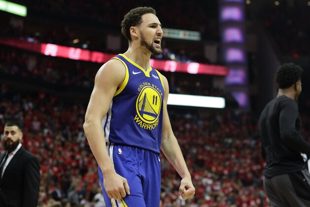 Golden State Warriors guard Klay Thompson celebrates the team's win over the Houston Rockets in Game 6 of a second-round NBA basketball playoff series Friday, May 10, 2019, in Houston. Golden State won 118-113, winning the series. (AP Photo/Eric Gay)