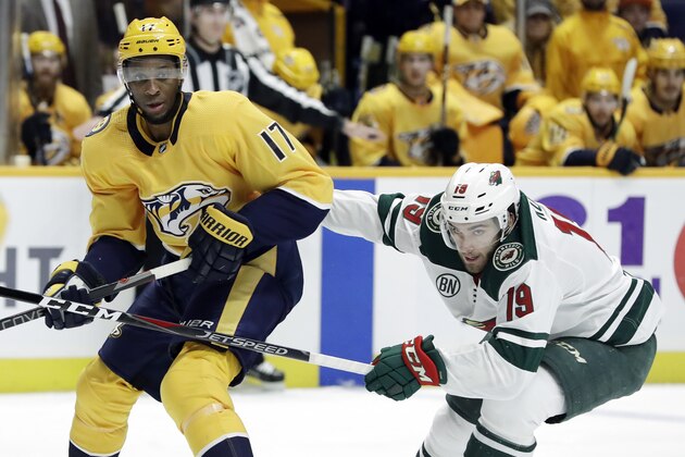 Nashville Predators forward Wayne Simmonds (17) plays against Minnesota Wild center Luke Kunin (19) in the first period of an NHL hockey game Tuesday, March 5, 2019, in Nashville, Tenn. (AP Photo/Mark Humphrey)
