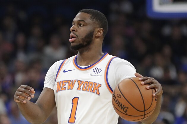 New York Knicks' Emmanuel Mudiay (1) moves the ball against the Orlando Magic during the first half of an NBA basketball game, Wednesday, April 3, 2019, in Orlando, Fla. (AP Photo/John Raoux)