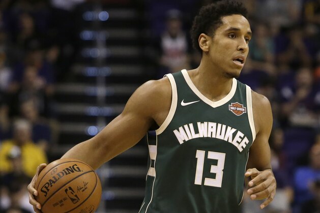 Milwaukee Bucks guard Malcolm Brogdon (13) in the second half during an NBA basketball game against the Phoenix Suns, Wednesday, Nov 22, 2017, in Phoenix. The Bucks defeated the Suns 113-107 in overtime. (AP Photo/Rick Scuteri)