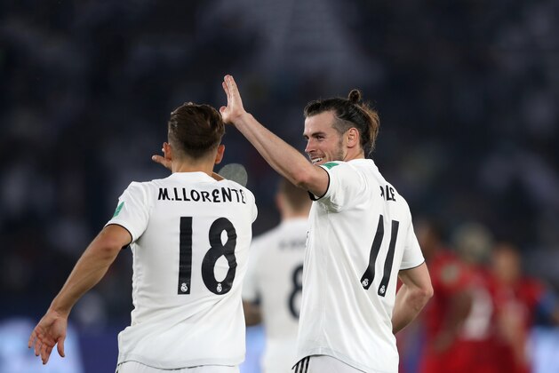 ABU DHABI, UNITED ARAB EMIRATES - DECEMBER 19: Gareth Bale of Real Madrid celebrates scoring their second goal with Marcos Llorente of Real Madrid during the FIFA Club World Cup semi-final match between Kashima Antlers and Real Madrid at Zayed Sports City Stadium on December 19, 2018 in Abu Dhabi, United Arab Emirates. (Photo by Francois Nel/Getty Images)