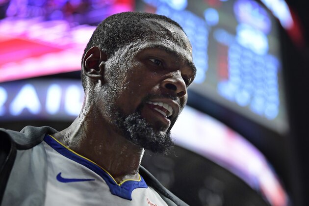 Golden State Warriors forward Kevin Durant paces around the bench during the first half in Game 3 of the team's first-round NBA basketball playoff series against the Los Angeles Clippers on Thursday, April 18, 2019, in Los Angeles. (AP Photo/Mark J. Terrill)