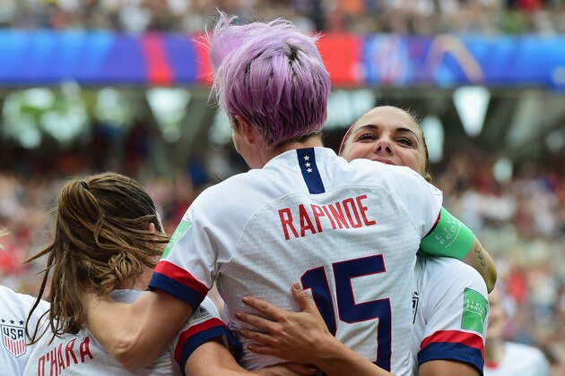REIMS, FRANCE - JUNE 24: Megan Rapinoe of USA celebrates with her teammates her first goal during the 2019 FIFA Women's World Cup France Round Of 16 match between Spain and USA at Stade Auguste Delaune on June 24, 2019 in Reims, France. (Photo by Pier Marco Tacca/Getty Images)