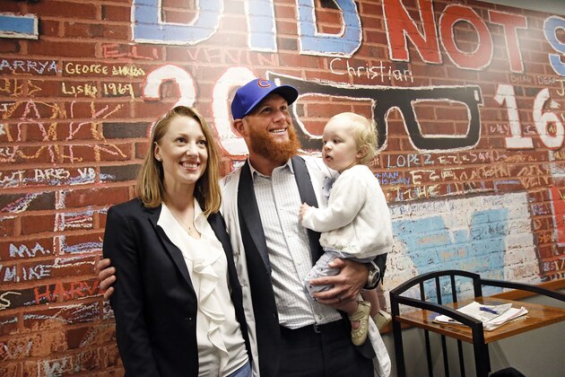 CHICAGO, ILLINOIS - JUNE 07:  Craig Kimbrel of the Chicago Cubs with his wife Ashely and their daughter Lydia Joy, 19mts, following an introductory press conference at Wrigley Field on June 07, 2019 in Chicago, Illinois. (Photo by Nuccio DiNuzzo/Getty Images)