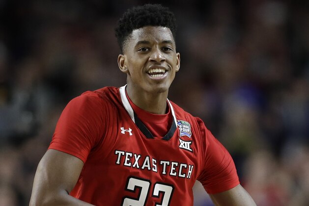 Texas Tech's Jarrett Culver (23) reacts during the second half in the championship of the Final Four NCAA college basketball tournament against Virginia, Monday, April 8, 2019, in Minneapolis. (AP Photo/David J. Phillip)