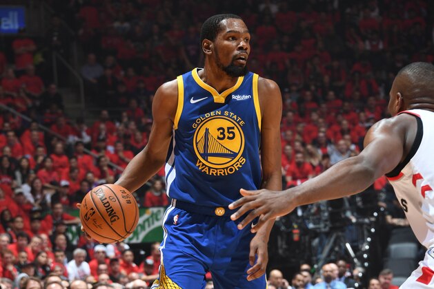 TORONTO, CANADA - JUNE 10: Kevin Durant #35 of the Golden State Warriors handles the ball against the Toronto Raptors  during Game Five of the NBA Finals on June 10, 2019 at Scotiabank Arena in Toronto, Ontario, Canada. NOTE TO USER: User expressly acknowledges and agrees that, by downloading and/or using this photograph, user is consenting to the terms and conditions of the Getty Images License Agreement. Mandatory Copyright Notice: Copyright 2019 NBAE (Photo by Andrew D. Bernstein/NBAE via Getty Images)