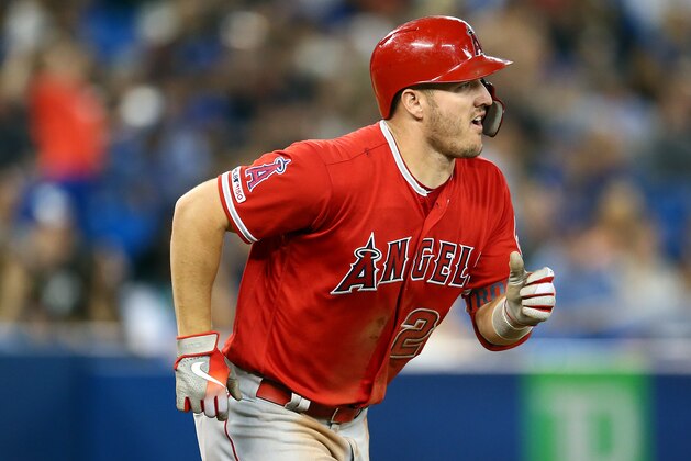 TORONTO, ON - JUNE 20:  Mike Trout #27 of the Los Angeles Angels of Anaheim flies out in the eighth inning during a MLB game against the Toronto Blue Jays at Rogers Centre on June 20, 2019 in Toronto, Canada.  (Photo by Vaughn Ridley/Getty Images)
