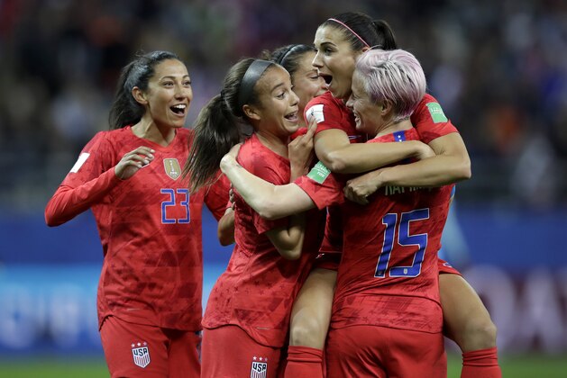 United States' Alex Morgan, second right, celebrates after scoring her side's 12th goal during the Women's World Cup Group F soccer match between United States and Thailand at the Stade Auguste-Delaune in Reims, France, Tuesday, June 11, 2019. Morgan scored five goals during the match. (AP Photo/Alessandra Tarantino)