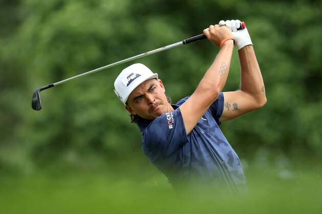 DETROIT, MICHIGAN - JUNE 27:  Rickie Fowler plays his shot from the ninth tee during round one of the Rocket Mortgage Classic at the Detroit Country Club on June 27, 2019 in Detroit, Michigan. (Photo by Gregory Shamus/Getty Images)