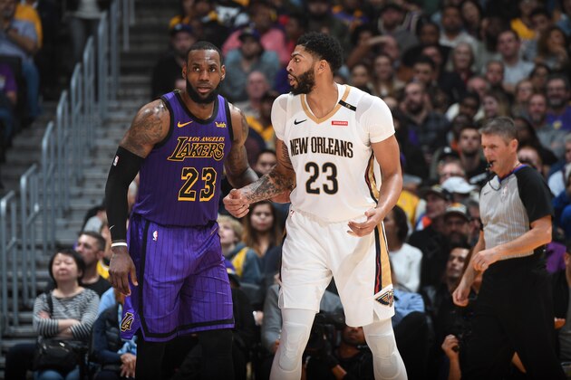 LOS ANGELES, CA - DECEMBER 21: LeBron James #23 of the Los Angeles Lakers and Anthony Davis #23 of the New Orleans Pelicans fight for position during a game on December 21, 2018 at STAPLES Center in Los Angeles, California. NOTE TO USER: User expressly acknowledges and agrees that, by downloading and/or using this Photograph, user is consenting to the terms and conditions of the Getty Images License Agreement. Mandatory Copyright Notice: Copyright 2018 NBAE (Photo by Andrew D. Bernstein/NBAE via Getty Images)