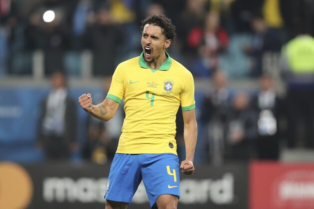 Brazil's Marquinho celebrates scoring his side's second goal against Paraguay during penalty kicks at the end of the Copa America quarterfinal soccer match at Arena do Gremio in Porto Alegre, Brazil, Thursday, June 27, 2019. (AP Photo/Edison Vara)