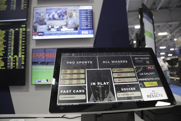 FILE - In this April 24, 2019, file photo, a monitor shows a Playtech bet tracker during the Betting On Sports America conference in Secaucus, N.J. The spread of legalized sports betting is largely following regional boundaries. Lawmakers across the Northeast and upper Midwest have generally approved it or are still considering doing so this year. But in the Deep South and far West, fewer states are rushing in a year after the US Supreme Court cleared the way for legal sports betting nationally. (AP Photo/Julio Cortez, File)