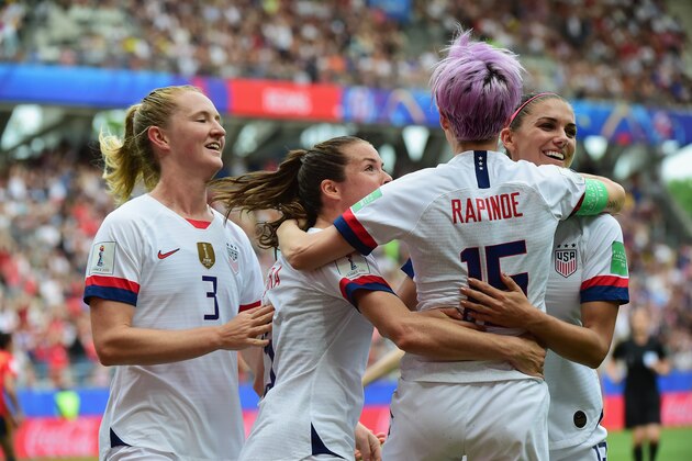 REIMS, FRANCE - JUNE 24: Megan Rapinoe of USA celebrates with her teammates her first goal during the 2019 FIFA Women's World Cup France Round Of 16 match between Spain and USA at Stade Auguste Delaune on June 24, 2019 in Reims, France. (Photo by Pier Marco Tacca/Getty Images)