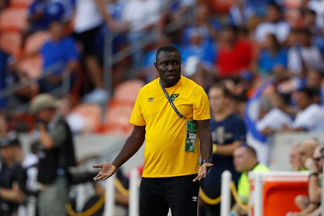 Jamaica's head coach Theodore Whitmore reacts to a call on the field during the CONCACAF Gold Cup Group C match against El Salvador on June 21, 2019 at BBVA Stadium in Houston, Texas. (Photo by AARON M. SPRECHER / AFP)        (Photo credit should read AARON M. SPRECHER/AFP/Getty Images)