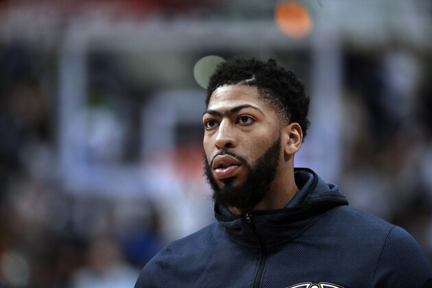 New Orleans Pelicans forward Anthony Davis (23) participates in warm ups before an NBA basketball game against the Dallas Mavericks in Dallas, Monday, March 18, 2019. (AP Photo/Tony Gutierrez)