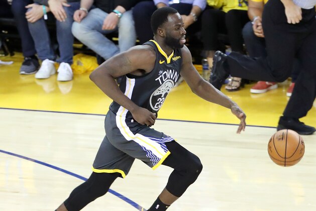 OAKLAND, CA - JUNE 13:  Draymond Green #23 of the Golden State Warriors brings the ball up the court against the Toronto Raptors during Game Six of the NBA Finals on June 13, 2019 at ORACLE Arena in Oakland, California. NOTE TO USER: User expressly acknowledges and agrees that, by downloading and/or using this photograph, user is consenting to the terms and conditions of Getty Images License Agreement. Mandatory Copyright Notice: Copyright 2019 NBAE (Photo by Joe Murphy/NBAE via Getty Images)