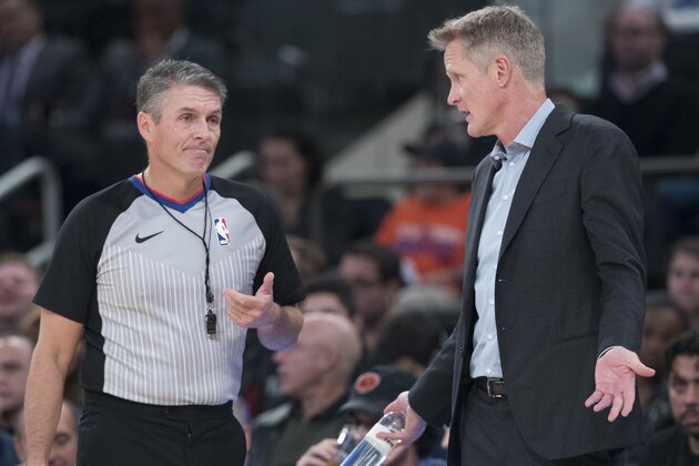 Golden State Warriors head coach Steve Kerr, right, argues with the referee Scott Foster during the first half of an NBA basketball game, Friday, Oct. 26, 2018, at Madison Square Garden in New York. (AP Photo/Mary Altaffer)