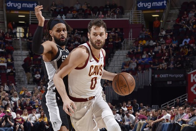 CLEVELAND, OH - APRIL 7: Kevin Love #0 of the Cleveland Cavaliers drives to the basket against the San Antonio Spurs on April 7, 2019 at Quicken Loans Arena in Cleveland, Ohio. NOTE TO USER: User expressly acknowledges and agrees that, by downloading and/or using this Photograph, user is consenting to the terms and conditions of the Getty Images License Agreement. Mandatory Copyright Notice: Copyright 2019 NBAE (Photo by David Liam Kyle/NBAE via Getty Images)