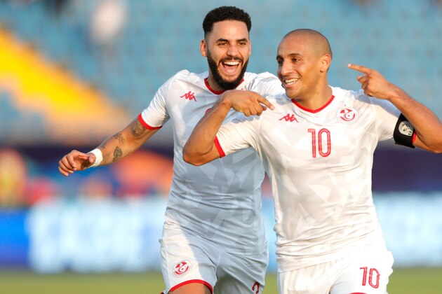 Tunisia's forward Wahbi Khazri (R) celebrates his goal during the 2019 Africa Cup of Nations (CAN) Group E football match between Tunisia and Mali at the Suez Stadium on June 28, 2019. (Photo by FADEL SENNA / AFP)        (Photo credit should read FADEL SENNA/AFP/Getty Images)