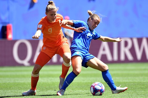 Netherlands' forward Vivianne Miedema (L) vies with Italy's midfielder Valentina Cernoia during the France 2019 Women's World Cup quarter-final football match between Italy and Netherlands, on June 29, 2019, at the Hainaut stadium in Valenciennes, northern France. (Photo by Philippe HUGUEN / AFP)        (Photo credit should read PHILIPPE HUGUEN/AFP/Getty Images)