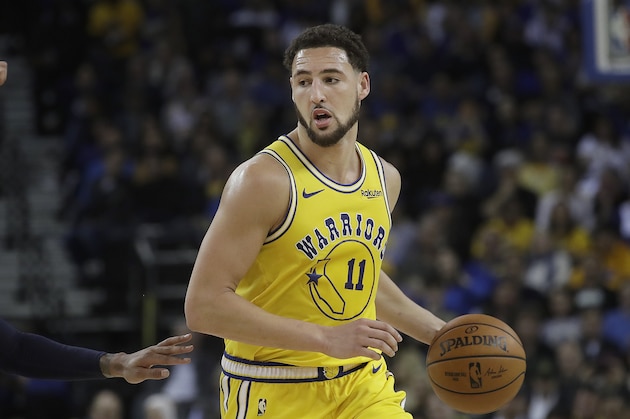 Golden State Warriors guard Klay Thompson (11) against the Denver Nuggets during an NBA basketball game in Oakland, Calif., Tuesday, April 2, 2019. (AP Photo/Jeff Chiu)