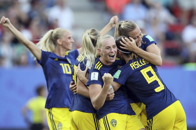 Sweden's Stina Blackstenius, middle, celebrates with teammates after scoring her side's second goal during the of the Women's World Cup quarterfinal soccer match between Germany and Sweden at Roazhon Park in Rennes, France, Saturday, June 29, 2019. (AP Photo/David Vincent)