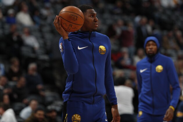 Golden State Warriors forward Kevon Looney (5) in the first half of an NBA basketball game Tuesday, Jan. 15, 2019, in Denver. (AP Photo/David Zalubowski)
