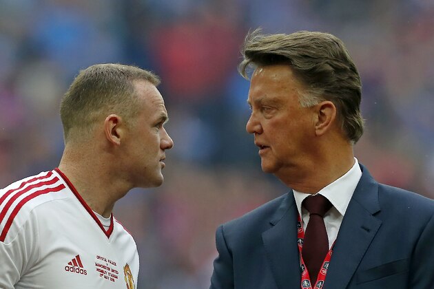 Manchester United's Dutch manager Louis van Gaal (R) talks to Manchester United's English striker Wayne Rooney ahead of the English FA Cup final football match between Crystal Palace and Manchester United at Wembley stadium in London on May 21, 2016. / AFP / IAN KINGTON / NOT FOR MARKETING OR ADVERTISING USE / RESTRICTED TO EDITORIAL USE        (Photo credit should read IAN KINGTON/AFP/Getty Images)