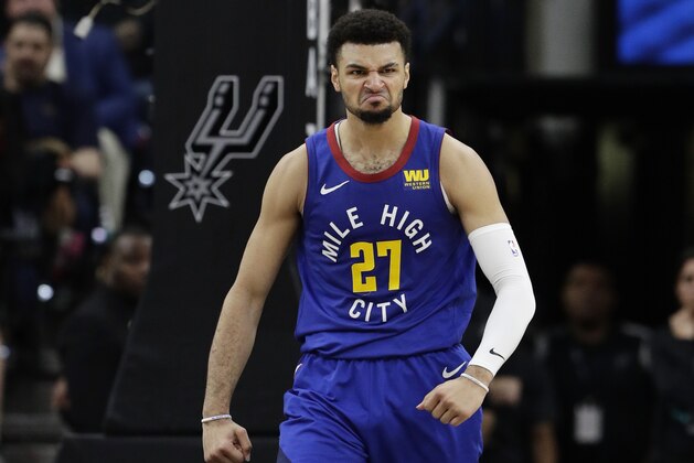 Denver Nuggets guard Jamal Murray (27) reacts after scoring against the San Antonio Spurs during the first half of Game 4 of an NBA basketball playoff series, in San Antonio, Saturday, April 20, 2019. (AP Photo/Eric Gay)