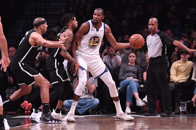 NEW YORK, NY - OCTOBER 28: Kevin Durant #35 of the Golden State Warriors handles the ball against D'Angelo Russell #1 of the Brooklyn Nets during the game at Barclays Center on October 28, 2018 in the Brooklyn borough of New York City. NOTE TO USER: User expressly acknowledges and agrees that, by downloading and or using this photograph, User is consenting to the terms and conditions of the Getty Images License Agreement. (Photo by Matteo Marchi/Getty Images)