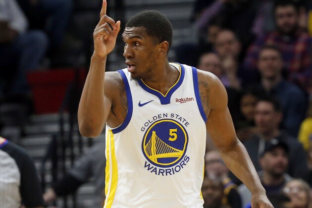 Golden State Warriors' Kevon Looney plays against the Minnesota Timberwolves in an NBA basketball game Tuesday, March 19, 2019, in Minneapolis. (AP Photo/Jim Mone)