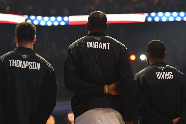 CHARLOTTE, NC - FEBRUARY 17: Klay Thompson #11, Kevin Durant #35 and Kyrie Irving #11 of Team LeBron stand on the court for the National Anthem before the 2019 NBA All-Star Game on February 17, 2019 at Spectrum Center in Charlotte, North Carolina. NOTE TO USER: User expressly acknowledges and agrees that, by downloading and or using this photograph, User is consenting to the terms and conditions of the Getty Images License Agreement. Mandatory Copyright Notice: Copyright 2019 NBAE (Photo by Juan Ocampo/NBAE via Getty Images)