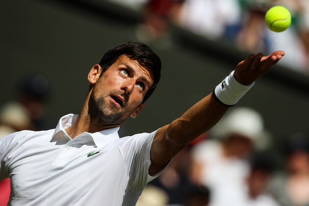 LONDON, ENGLAND - JULY 01: Novak Djokovic of Serbia competes in his Men's Singles first round match against Philipp Kohlschreiber of Germany during Day one of The Championships - Wimbledon 2019 at All England Lawn Tennis and Croquet Club on July 01, 2019 in London, England. (Photo by Shi Tang/Getty Images)