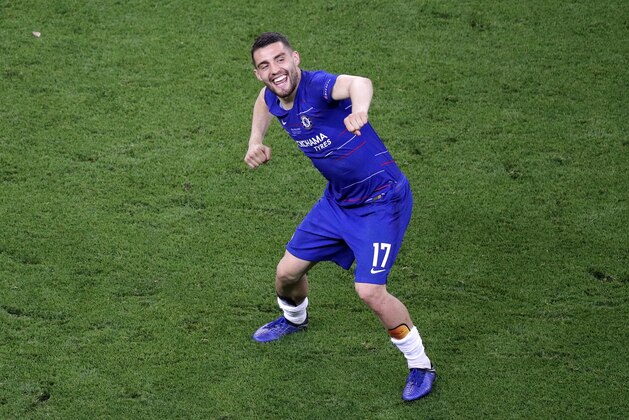 Chelsea's Mateo Kovacic celebrates after his team's 4-1 win in the Europa League Final soccer match between Chelsea and Arsenal at the Olympic stadium in Baku, Azerbaijan, Wednesday, May 29, 2019. (AP Photo/Dmitri Lovetsky)