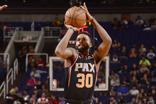 PHOENIX, AZ - APRIL 5: Troy Daniels #30 of the Phoenix Suns shoots the ball against the New Orleans Pelicans on April 5, 2019 at Talking Stick Resort Arena in Phoenix, Arizona. NOTE TO USER: User expressly acknowledges and agrees that, by downloading and or using this photograph, user is consenting to the terms and conditions of the Getty Images License Agreement. Mandatory Copyright Notice: Copyright 2019 NBAE (Photo by Barry Gossage/NBAE via Getty Images)