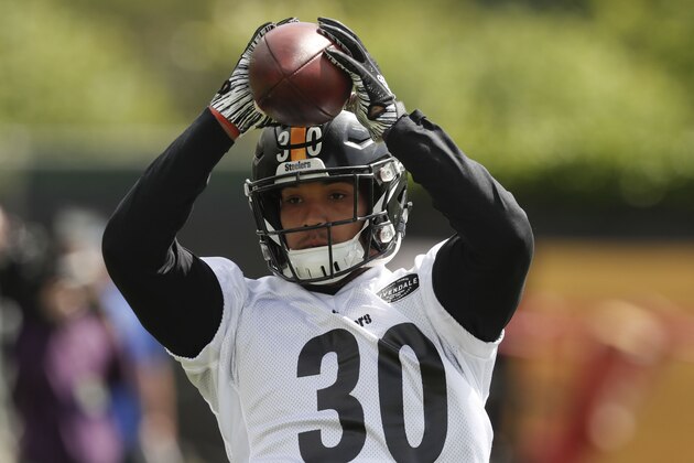 Pittsburgh Steelers running back James Conner (30) during an NFL football practice, Tuesday, May 21, 2019, in Pittsburgh. (AP Photo/Keith Srakocic)