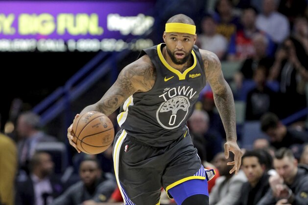 Golden State Warriors center DeMarcus Cousins (0) brings the ball up court against the New Orleans Pelicans in the first half of an NBA basketball game in New Orleans, Tuesday, April 9, 2019. (AP Photo/Scott Threlkeld)