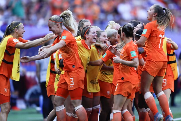 Netherlands' players celebrate their victory after the Women's World Cup quarterfinal soccer match between Italy and the Netherlands, at the Stade du Hainaut stadium in Valenciennes, France, Saturday, June 29, 2019. (AP Photo/Michel Spingler)